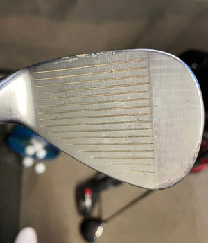 image of a dirty golf club before golfs green jacket spray solution has been applied